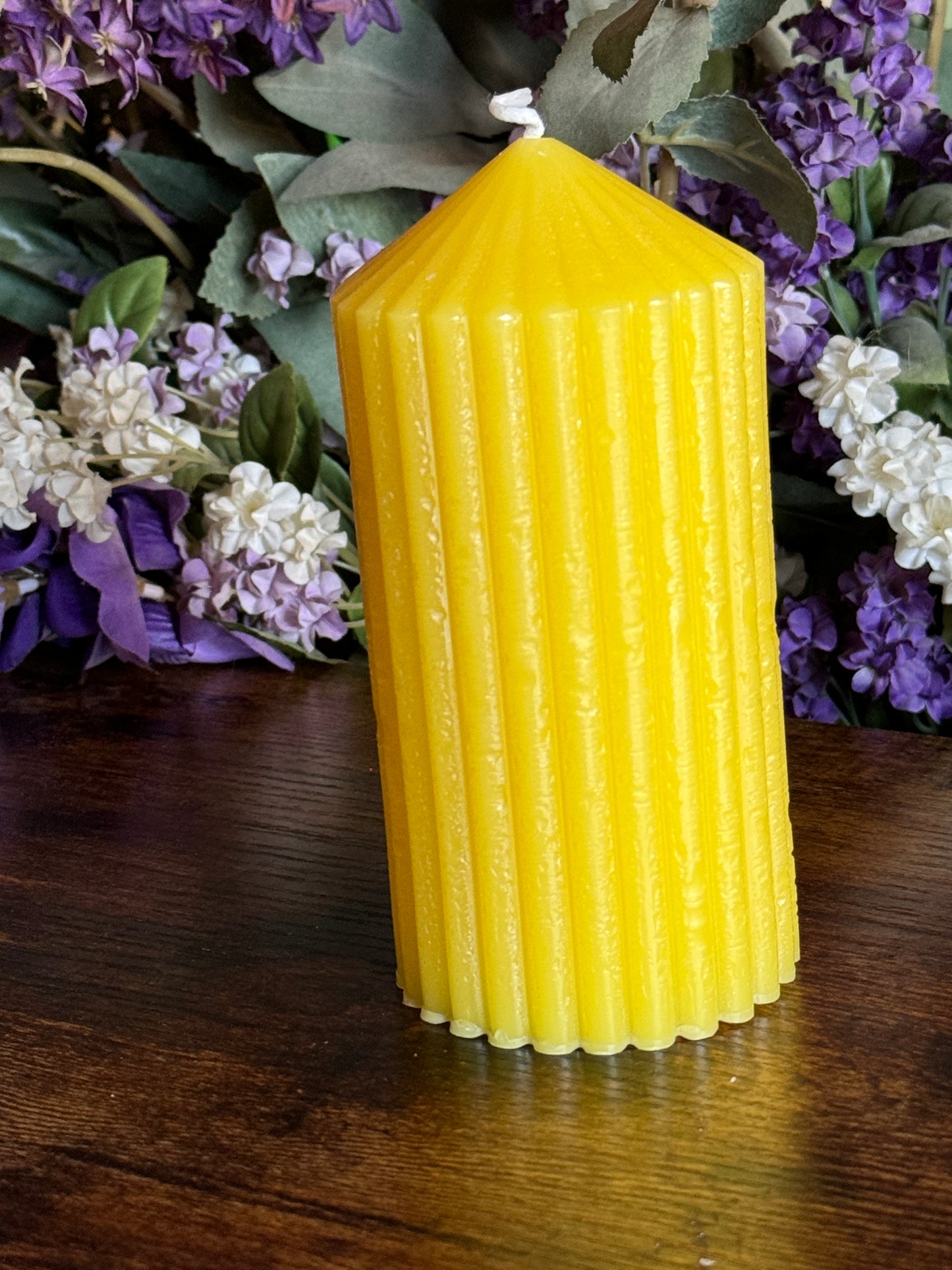 Ridged beeswax pillar candle